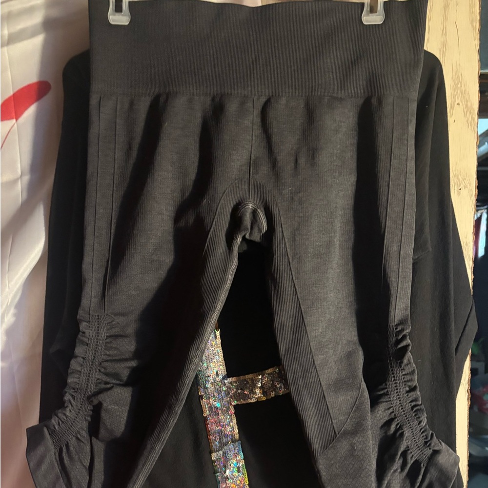 Lululemon Flow Crop II black ruched cropped legging.